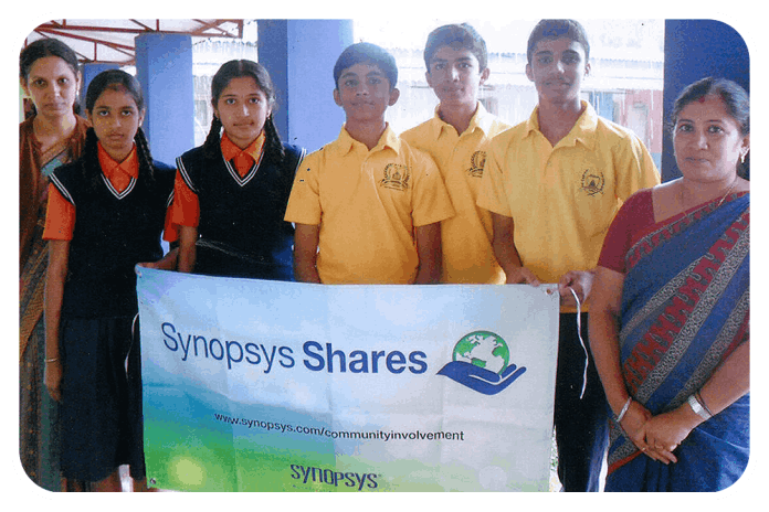 Students expressing gratitude to donors of laptop computers, at Roots Educational Trust, T. Shettigeri.