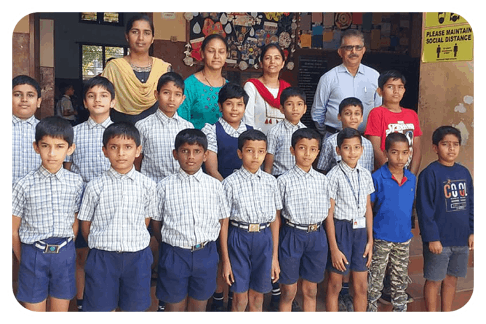 Children from KESST's Sainik School Entrance Examination Coaching Class with coaching teachers.